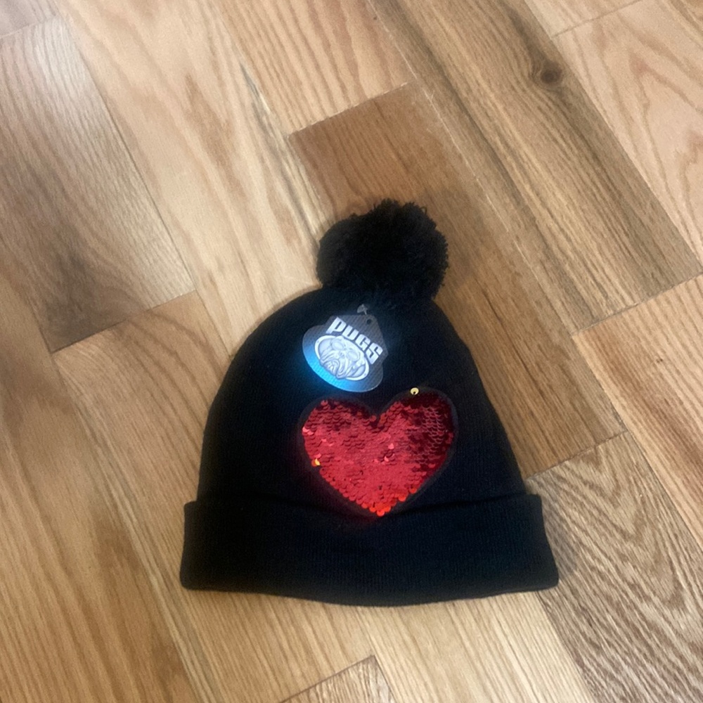 Pugs black knit with Pom Pom with sequin heart on it hat